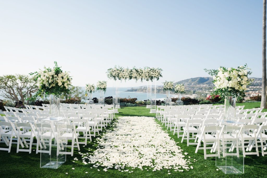 white ceremony florals, white oceanfront ceremony, aisle petals, floral design, florist, wedding florist, wedding flowers, orange county weddings, orange county wedding florist, orange county florist, orange county floral design, flowers by cina