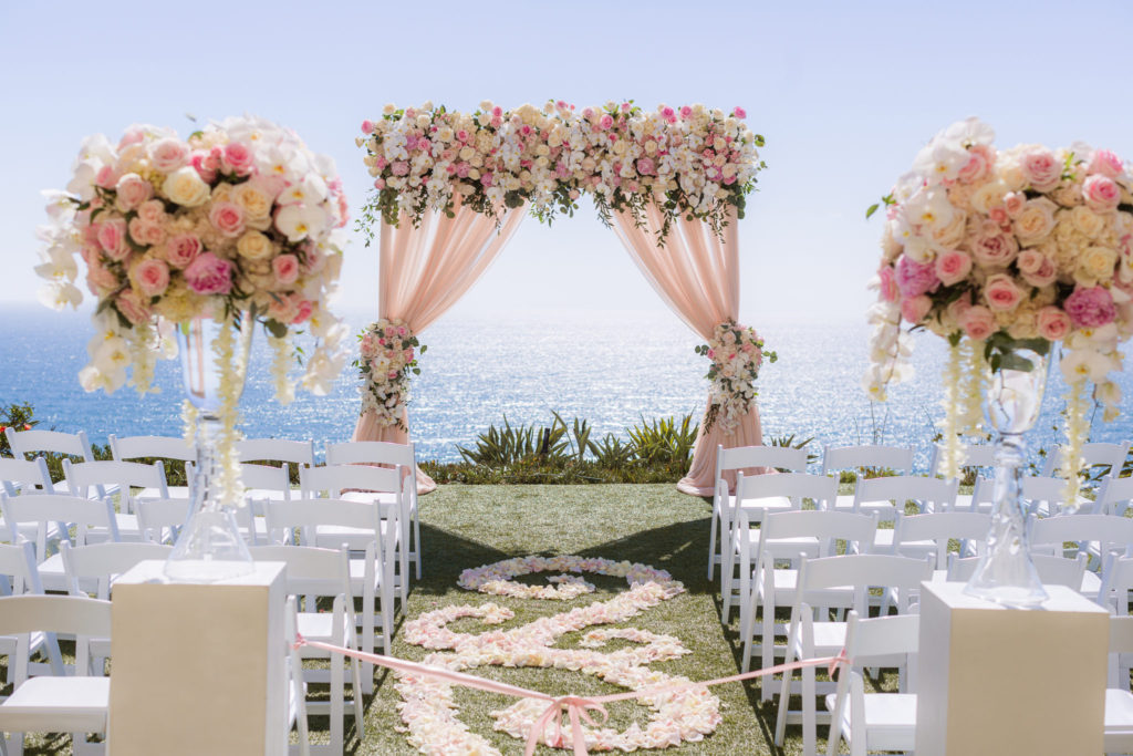 pink ceremony arch, pink oceanfront wedding, pink ceremony florals, floral design, florist, wedding florist, wedding flowers, orange county weddings, orange county wedding florist, orange county florist, orange county floral design, flowers by cina
