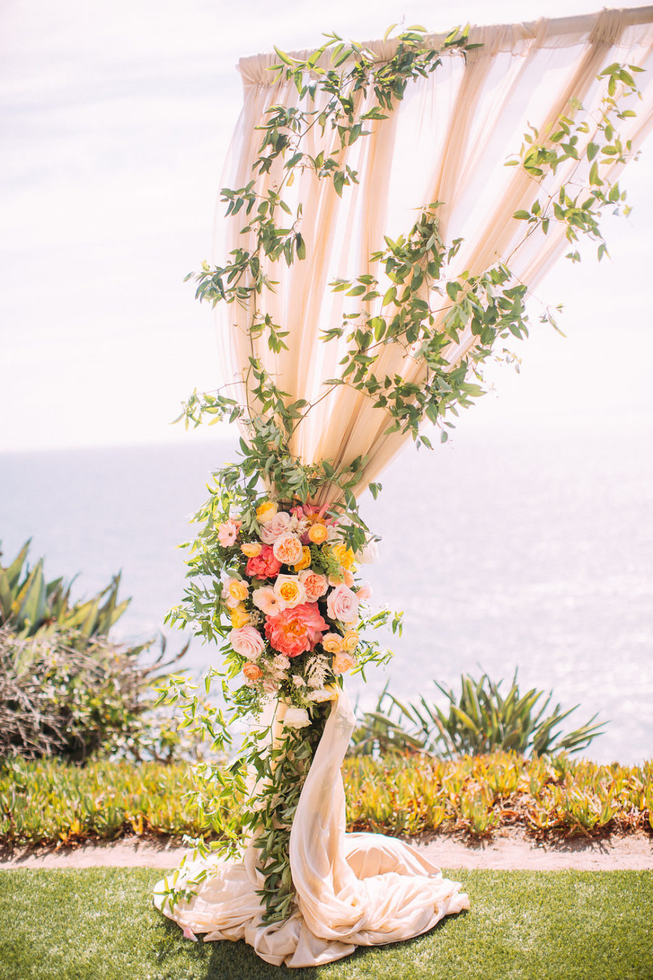 inside weddings feature, floral arch, pink floral arch, floral design, florist, wedding florist, wedding flowers, orange county weddings, orange county wedding florist, orange county florist, orange county floral design, flowers by cina