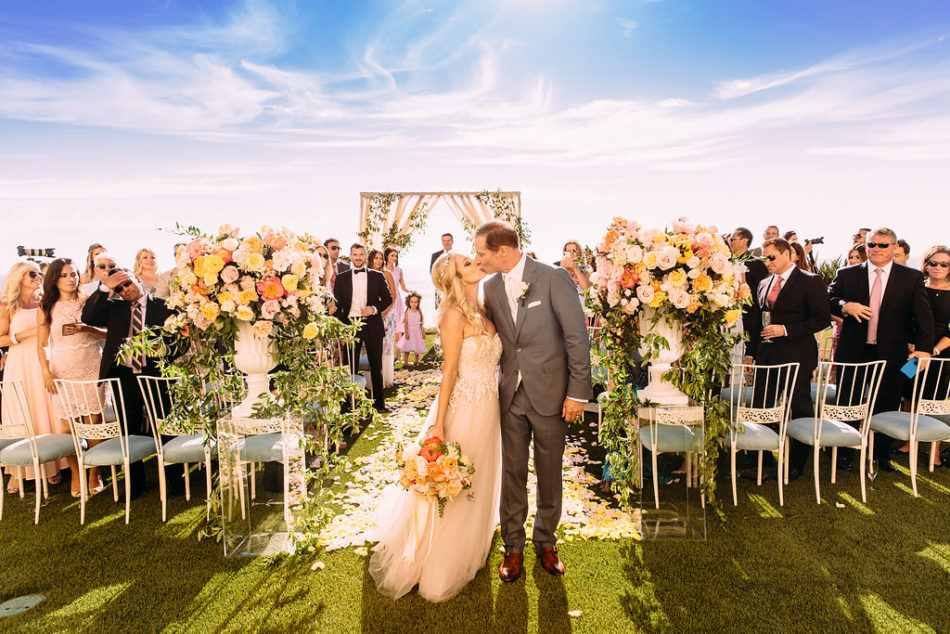 bride and groom, inside weddings feature, first kiss, floral design, florist, wedding florist, wedding flowers, orange county weddings, orange county wedding florist, orange county florist, orange county floral design, flowers by cina