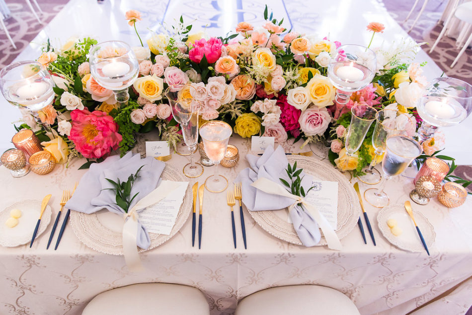 inside weddings feature, colorful centerpiece, pink and orange centerpiece, floral design, florist, wedding florist, wedding flowers, orange county weddings, orange county wedding florist, orange county florist, orange county floral design, flowers by cina