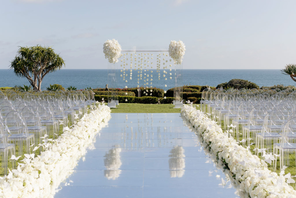 mirrored aisle, white ceremony setup, lavish oceanfront wedding, floral design, florist, wedding florist, event florist, wedding flowers, event flowers, cabo san lucas weddings, cabo san lucas wedding florist, cabo san lucas florist, cabo san lucas floral design, cabo rentals, flowers and events