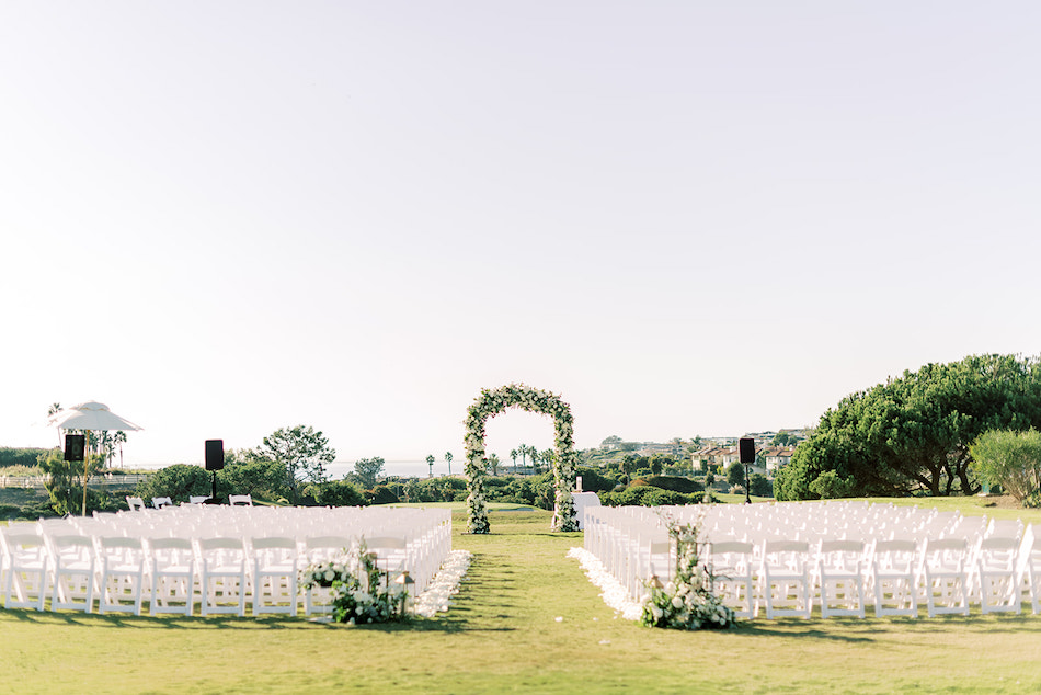 horseshoe ceremony arch, oceanfront ceremony, lush ceremony, floral design, florist, wedding florist, wedding flowers, orange county weddings, orange county wedding florist, orange county florist, orange county floral design, flowers by cina
