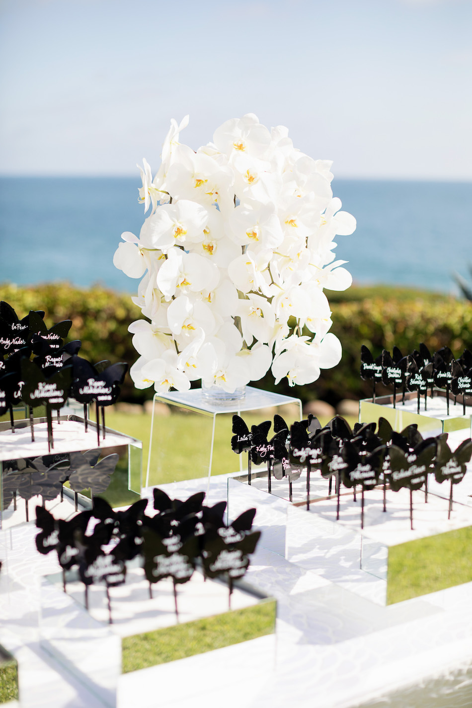 display cards, butterfly decor, white orchids, floral design, florist, wedding florist, wedding flowers, orange county weddings, orange county wedding florist, orange county florist, orange county floral design, flowers by cina